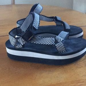 Teva platforms, size 8. Worn once or twice.